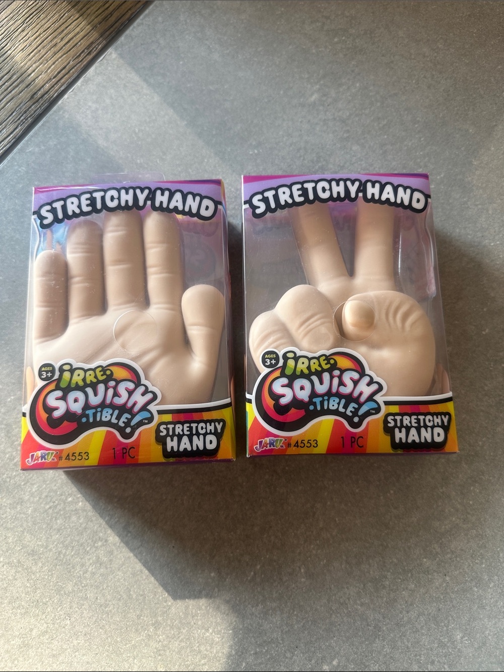JA-RU IRRE-SQUISH-TIBLE Stretchy Hand Pair ✋🏼 ✌🏼